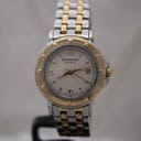 Front view of Raymond Weil 5360 two-tone quartz watch with cream dial, gold Roman numerals, date window at 3 o'clock, and gold-tone bezel.