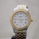 Front view of the Tissot PR 50 two-tone quartz watch with a white dial, Roman numeral indices, and date window at 3 o'clock.
