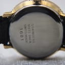 Close-up of the watch case back showing "STAINLESS STEEL BACK SWISS MADE 1681" engraving.