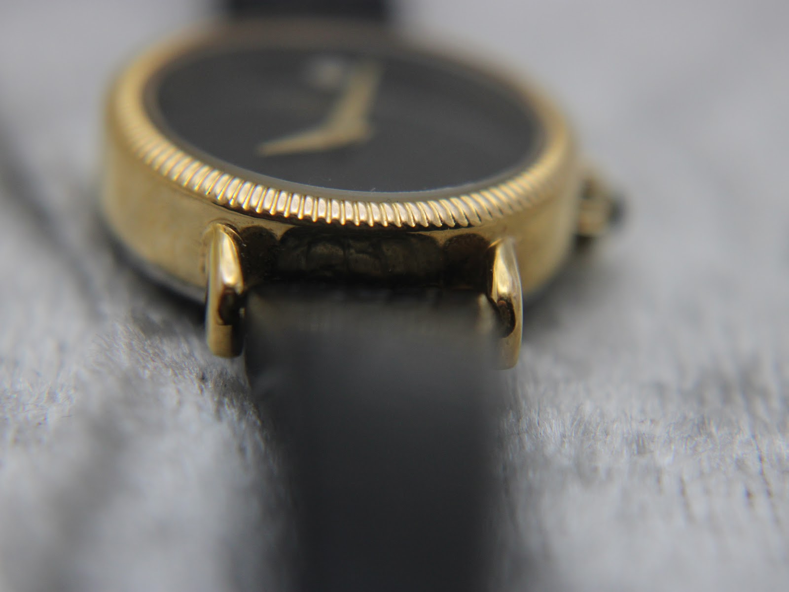 Another close-up side view of the watch case and lugs, focusing on the craftsmanship and finishing.