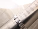 Close-up of the watch bracelet wrapped around a wrist sizing gauge, indicating a maximum wrist circumference of approximately 172mm or 17.2cm.