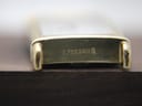 Close-up of the lug area on the underside of the watch, showing "PLAQUE G 10µ" engraving