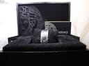 The Versace ESQ99 watch presented beautifully within its original black velvet-lined box with the included booklet.