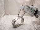 Digital caliper measuring the width of the watch case, displaying a precise reading of 20.15mm.