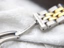 Close-up view of the Certina DS Caimano's fold-over clasp, showing "Certina" and "Titanium" engravings on the components.