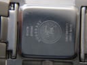 Close-up of the watch case back, showing engraved Burberry logo, model BU4500, serial 01419, water resistance, and Swiss Made.