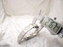 Digital caliper measuring the width of the Burberry watch case (excluding crown), displaying a reading of 21.67mm.