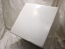 The white outer cardboard box for the Maurice Lacroix watch, with brand logo.