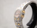 Side profile view of the Maurice Lacroix watch showing the crown and the curved case design.