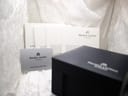 Close-up of the Maurice Lacroix international warranty card and instruction booklets.