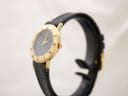Side profile of Gucci 3000L watch case with signed 'G' crown and slim design.