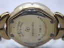 Close-up of the Raymond Weil Adagio watch case back, showing "Water Resistant - Patented Model", "RW Raymond Weil", "9935-2" and "18K GOLD ELECTROPLATED 10M".
