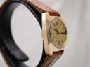 Angled side view of the Bulova watch case and crown, emphasising the profile on a stand.