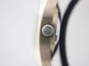 Extreme close-up of the signed Bulova crown, showing the detailed 'BULOVA' engraving.