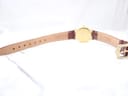 Back view of the Raymond Weil 9923 watch and the brown leather strap, showing the underside of the strap and the gold-tone buckle.