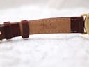 Close-up of the underside of the brown leather strap, clearly showing the "Darlena" brand stamp.