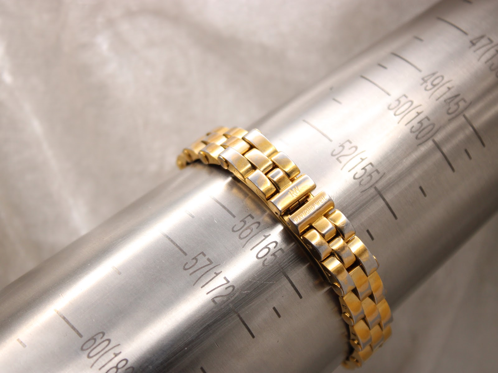 Watch bracelet on a wrist sizing mandrel, indicating a wrist size of approximately 160mm
