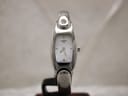 Front view of Tissot C845 ladies' bangle watch with white mother-of-pearl dial and silver indices.