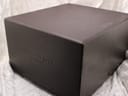 Outer brown Raymond Weil presentation box with an embossed 'Raymond Weil Genève' logo.