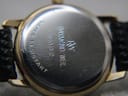 Close-up of the polished case back, showing 'RAYMOND WEIL', '5332', and 'WATER RESISTANT' engravings with some light scratches.
