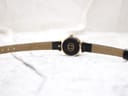 Underside view of the Gucci 2000L strap, showing 'LIZARD CALF 10' text indicating material and lug width.