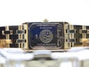 Close-up of the watch case back, detailing 'WATER RESISTANT 5ATM', 'SWISS MADE', 'Collection Tango', '5971', and 'GOLD ELECTROPLATED 10M'.