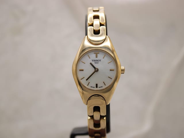 TISSOT G349 — photo 1
