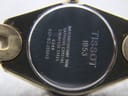 Close-up of the stainless steel case back of the Tissot G349, showing 'Tissot 1853', 'Waterresistant 30m', 'Sapphire Crystal', 'Stainless Steel', and 'G349' engravings.