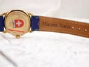Close-up of the Michel Jordi signed brown leather strap interior.