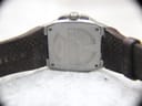 Rear view of the Lotus 15509 watch, displaying the stainless steel case back and the full brown leather strap with contrast stitching.