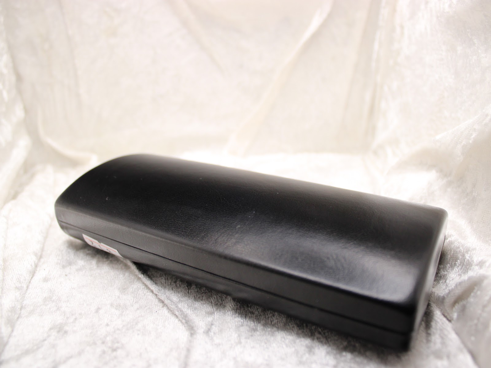 The closed, black rectangular Mondaine presentation box.