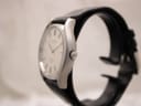 Side profile view of the Bulova Accutron watch case and crown, showing the brushed finish.