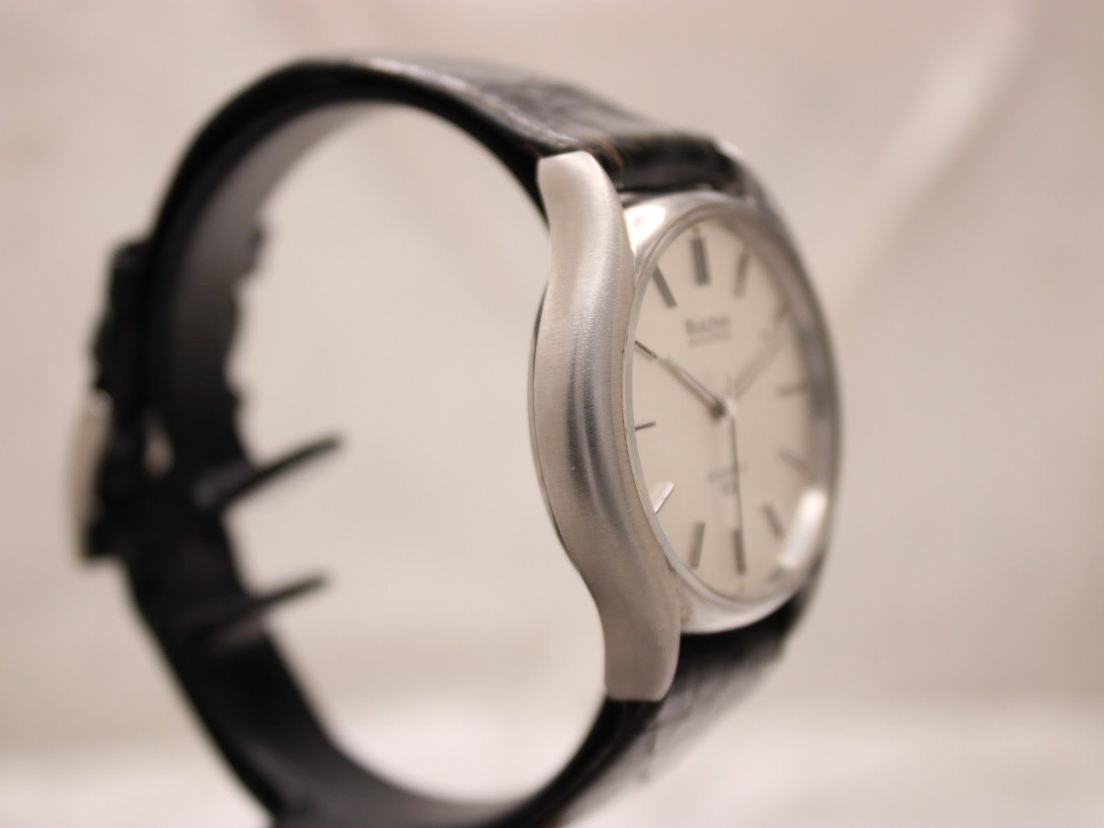 Another side profile view of the Bulova Accutron watch, highlighting the elegant curved case design.