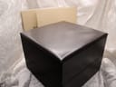 Top view of the closed dark brown Burberrys presentation box.