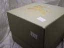 Beige Burberrys outer box with gold foil logo and sticker "815".