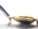 Close-up of the watch crown, signed with the Burberrys "B" logo.