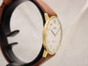 Angled side view of the Roamer Canterbury watch, highlighting the slender gold-tone case profile and simple lugs.