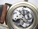 Close-up of the Roamer 17 jewels manual wind movement inside the watch, showcasing gears and ruby jewels.