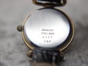 Close-up of the watch's stainless steel case back, clearly showing the engraved text 'stainless steel back', '4093', and '362'.
