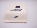 Close-up of the Raymond Weil Owners Maintenance Guarantee booklet on a white background.