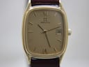 Front view close-up of the Zenith gold-plated rectangular dial with applied indices, roman numerals, and date window.