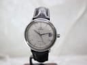 Front view of vintage Omega De Ville automatic watch featuring a silver linen dial with date display and applied baton indices, paired with a black leather strap.