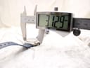 Digital caliper measuring the case width of the Omega Genève Dynamic watch, displaying 31.29mm.