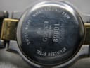 Close-up of the watch's brushed stainless steel case back, engraved with "Gucci Timepieces 8900L", "Swiss Made", and "Water Resistant 3 ATM".