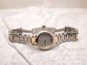 Overall view of the open Gucci 8900L watch with its bi-tone bracelet fully extended, ready for wear.