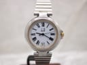Front view of the Dunhill Millennium watch with white dial, black Roman numerals, and two-tone steel bracelet.