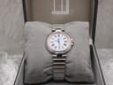 Dunhill Millennium watch displayed on its cushion inside the original Dunhill presentation box.