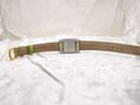 Underside view of the green leather strap, showing "14MM R.C.C STRAP MADE IN FRANCE" and "GUCCI" embossed markings.