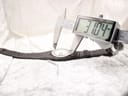 Digital caliper measuring the Gucci 104 watch case diameter, displaying 31.04 mm.