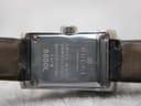 Close-up of the stainless steel case back of the Gucci 8600L, clearly showing engravings for "Swiss Made", "Stainless Steel", "3 ATM", and "8600L".